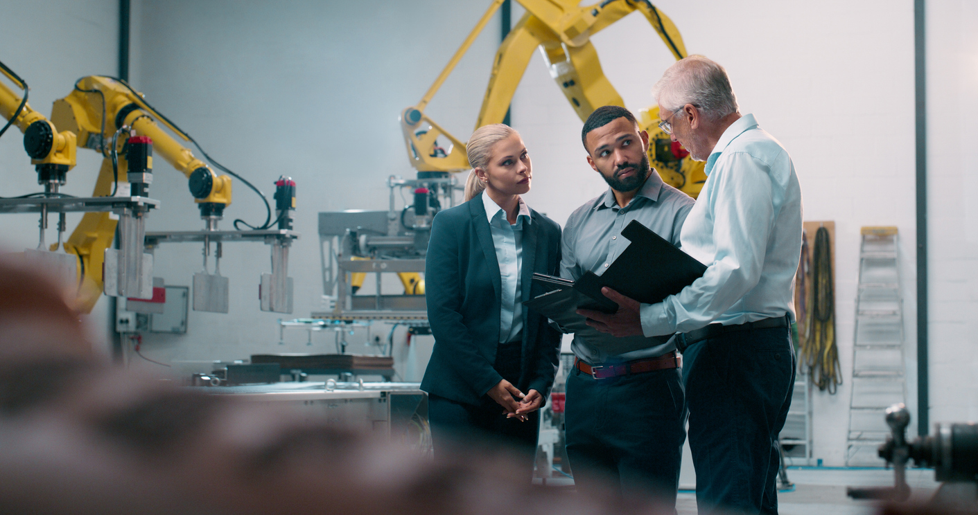 obotics, staff and engineer collaboration with industrial teamwork and working in warehouse. Factory, engineering and futuristic work of manufacturing management with discussion for cnc automation